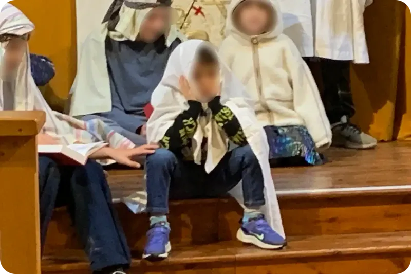 A shot of some of the young shepherds.  One in particular with his head in his hands looking less than enthusistic!..Faces have been blurred.